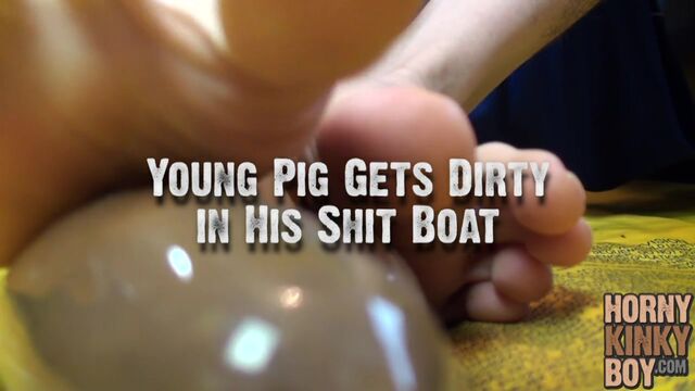 Young Pig Gets Dirty in His Shit Boat