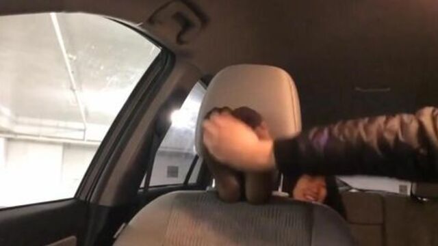 Asian girl gets her feet worshiped and sniffed in a car